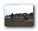 На пляже Ла-Пинеды.  Негритянки предлагают заплести косички